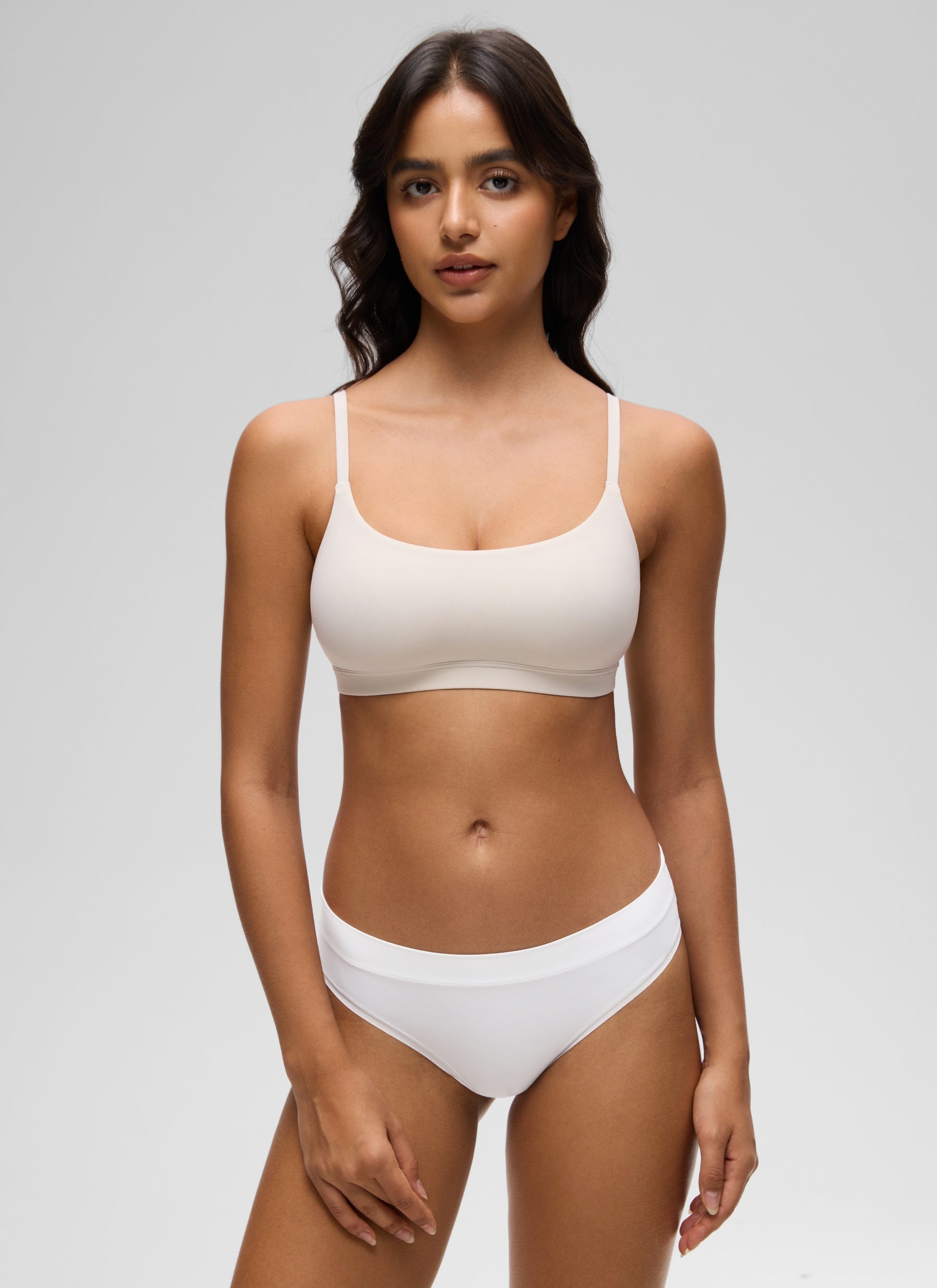 CRZ YOGA Women's Softhold Wireless Scoop Neck  Everyday Bra Adjustable Milky White @model_info:Liss