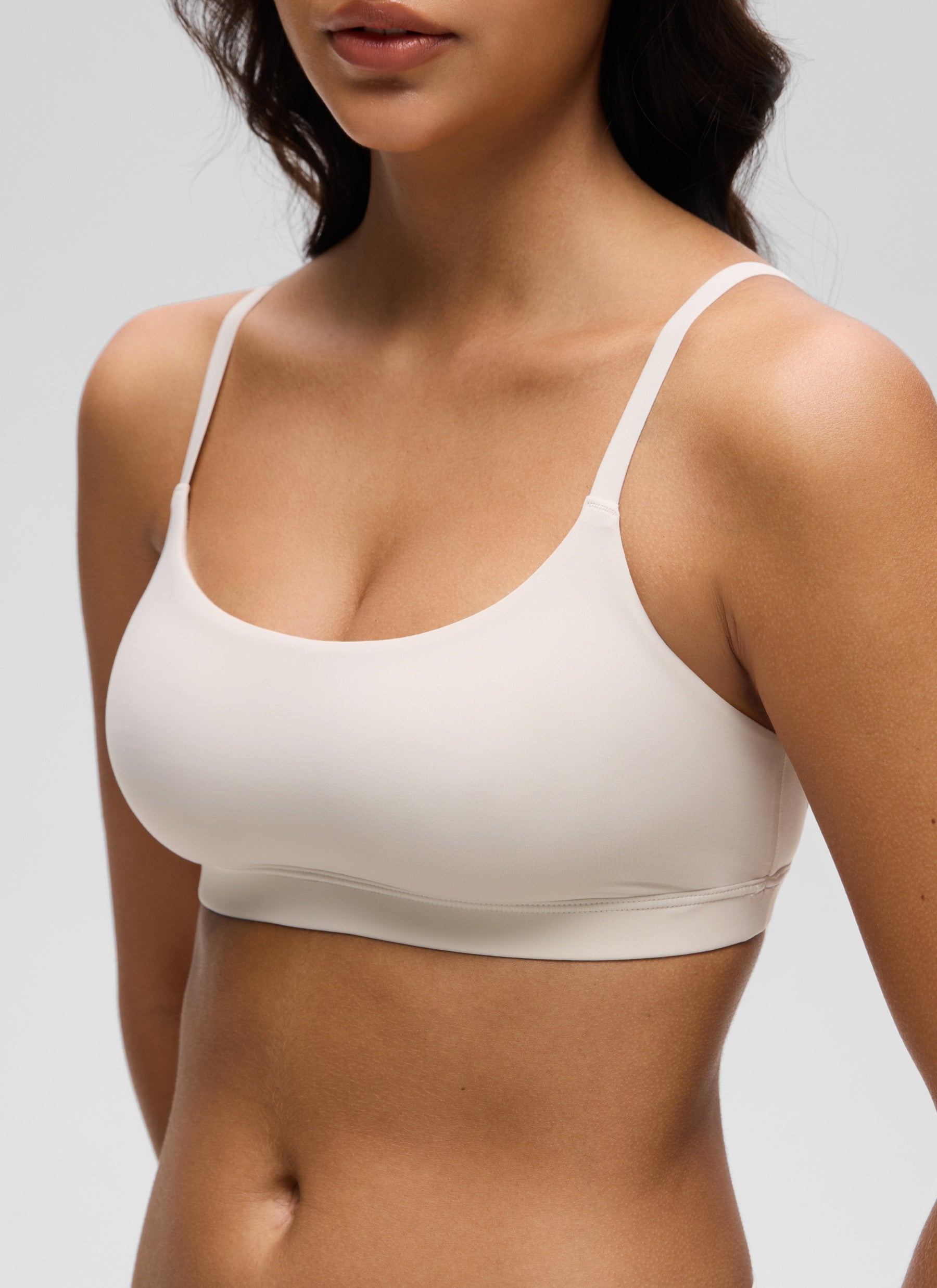 CRZ YOGA Women's Softhold Wireless Scoop Neck  Everyday Bra Adjustable Milky White @model_info:Liss