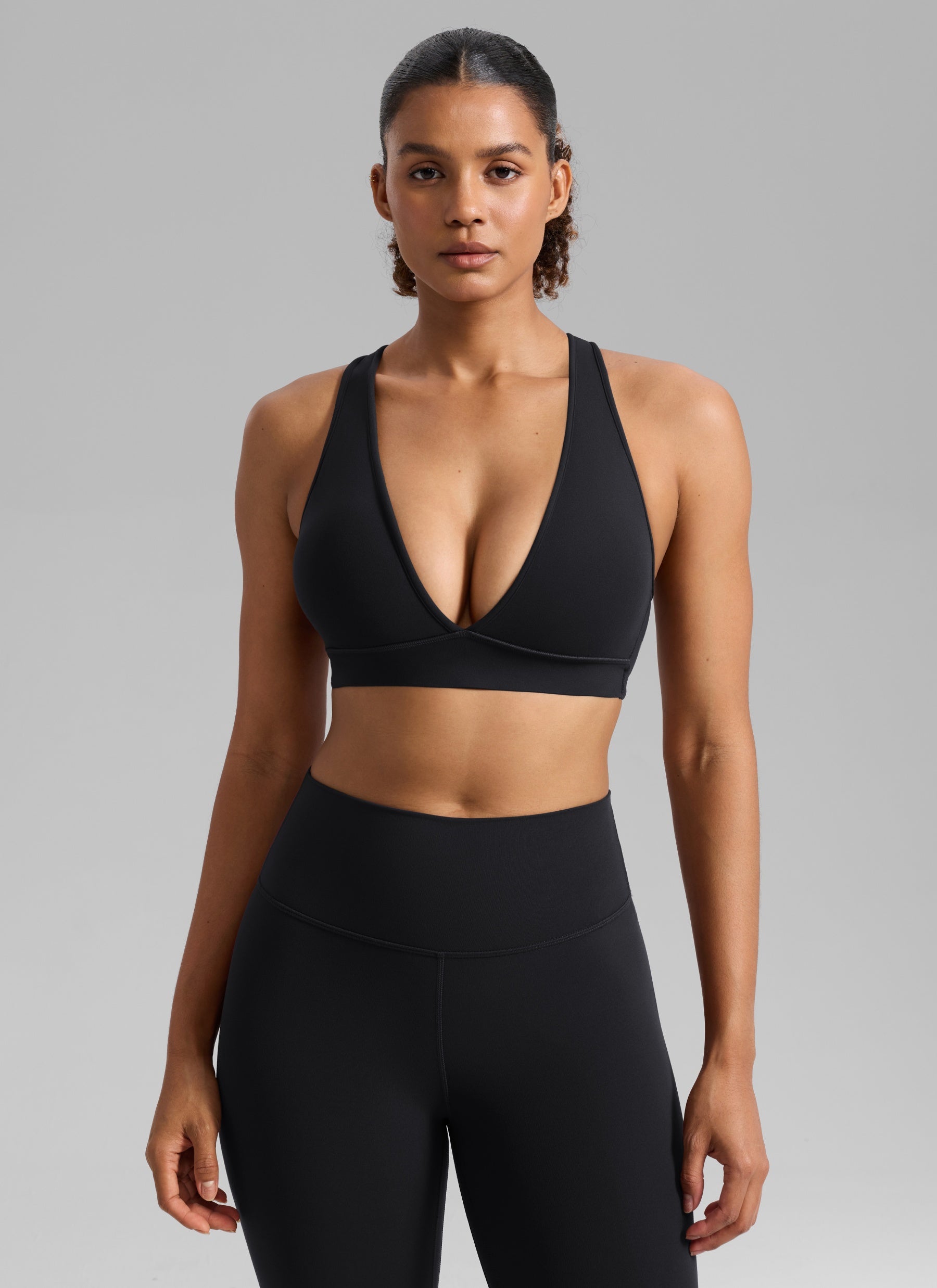 CRZ YOGA Women's Butterlift® Workout Deep V Neck Cross Back Sports Bra Black @model_info:Barbara