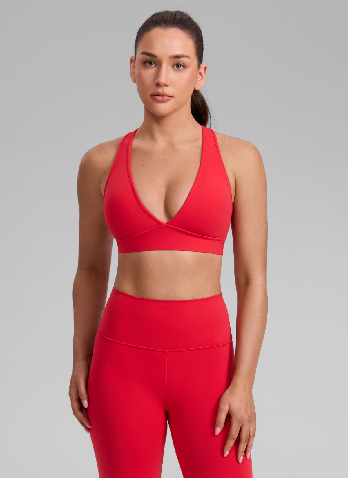 CRZ YOGA Women's Butterlift® Workout Deep V Neck Cross Back Sports Bra Aurora Red @model_info:Brooklyn