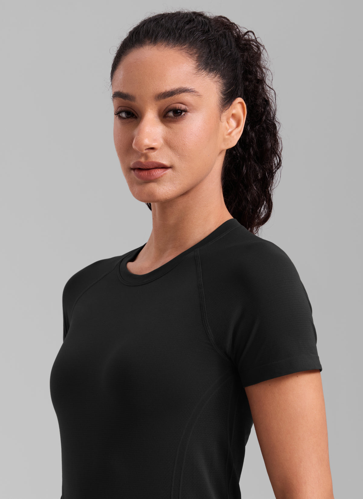 CRZ YOGA Women's Running Classic Fit Shirts Seamless Short Sleeves Black @model_info:Larissa