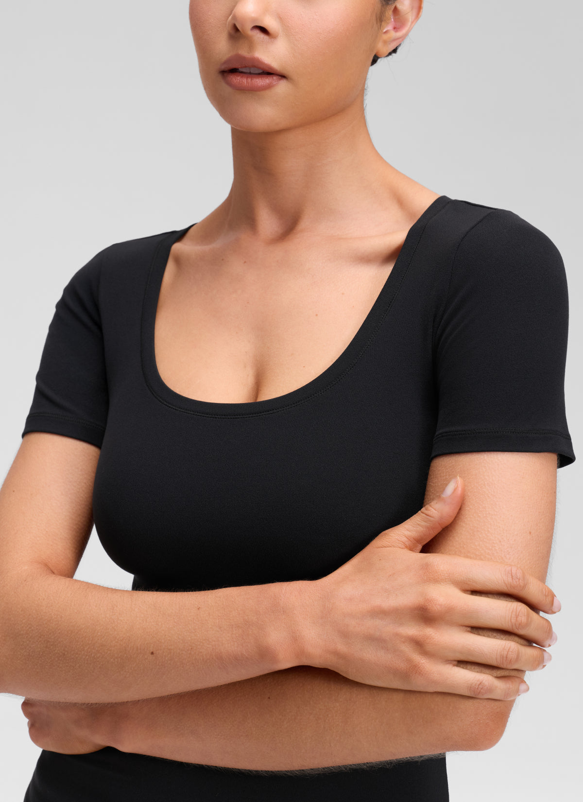 CRZ YOGA Women's Softembrace Casual U Neck Tight Fit Short Sleeve Black @model_info:Marcela