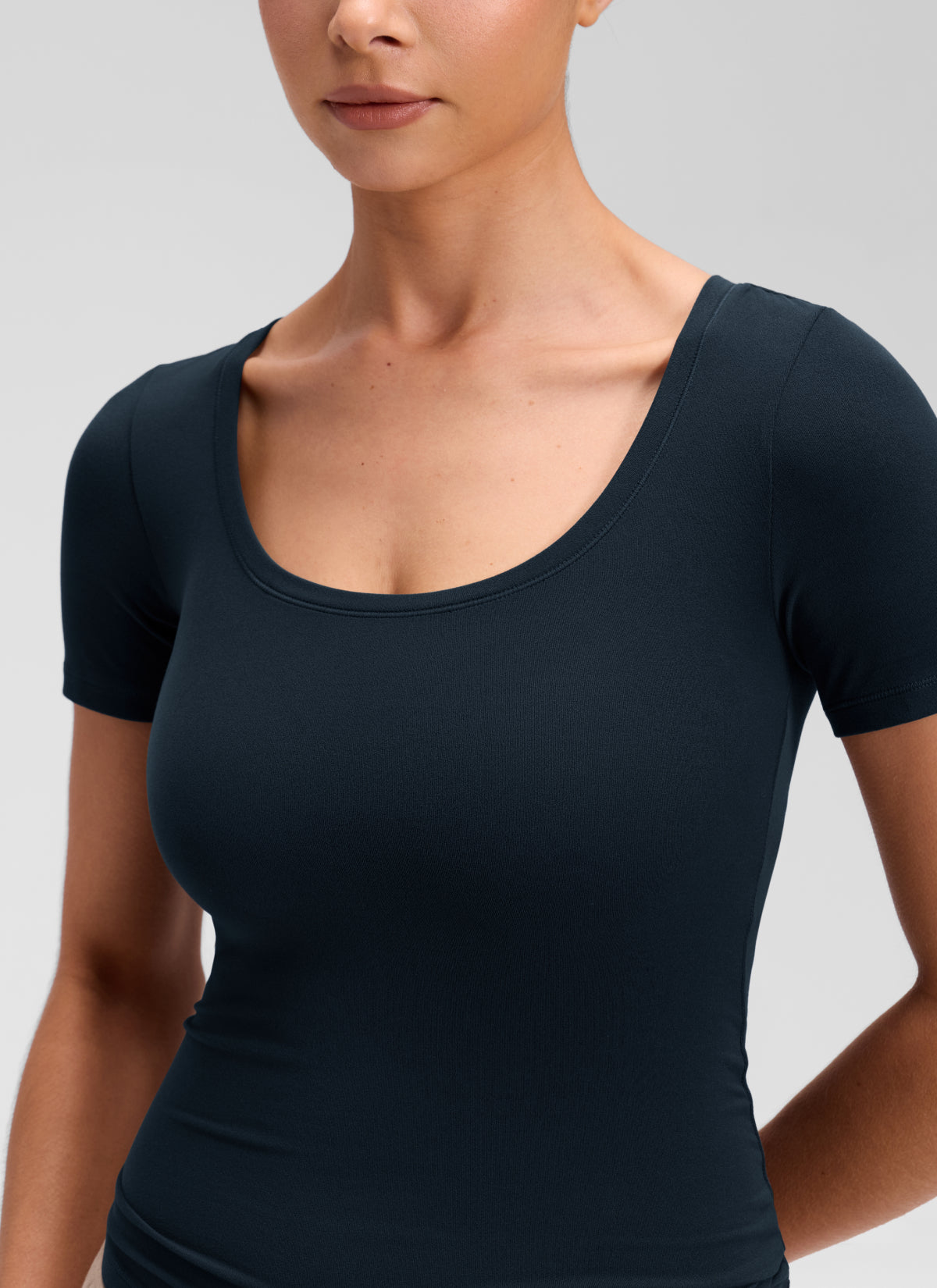 CRZ YOGA Women's Softembrace Casual U Neck Tight Fit Short Sleeve True Navy @model_info:Marcela