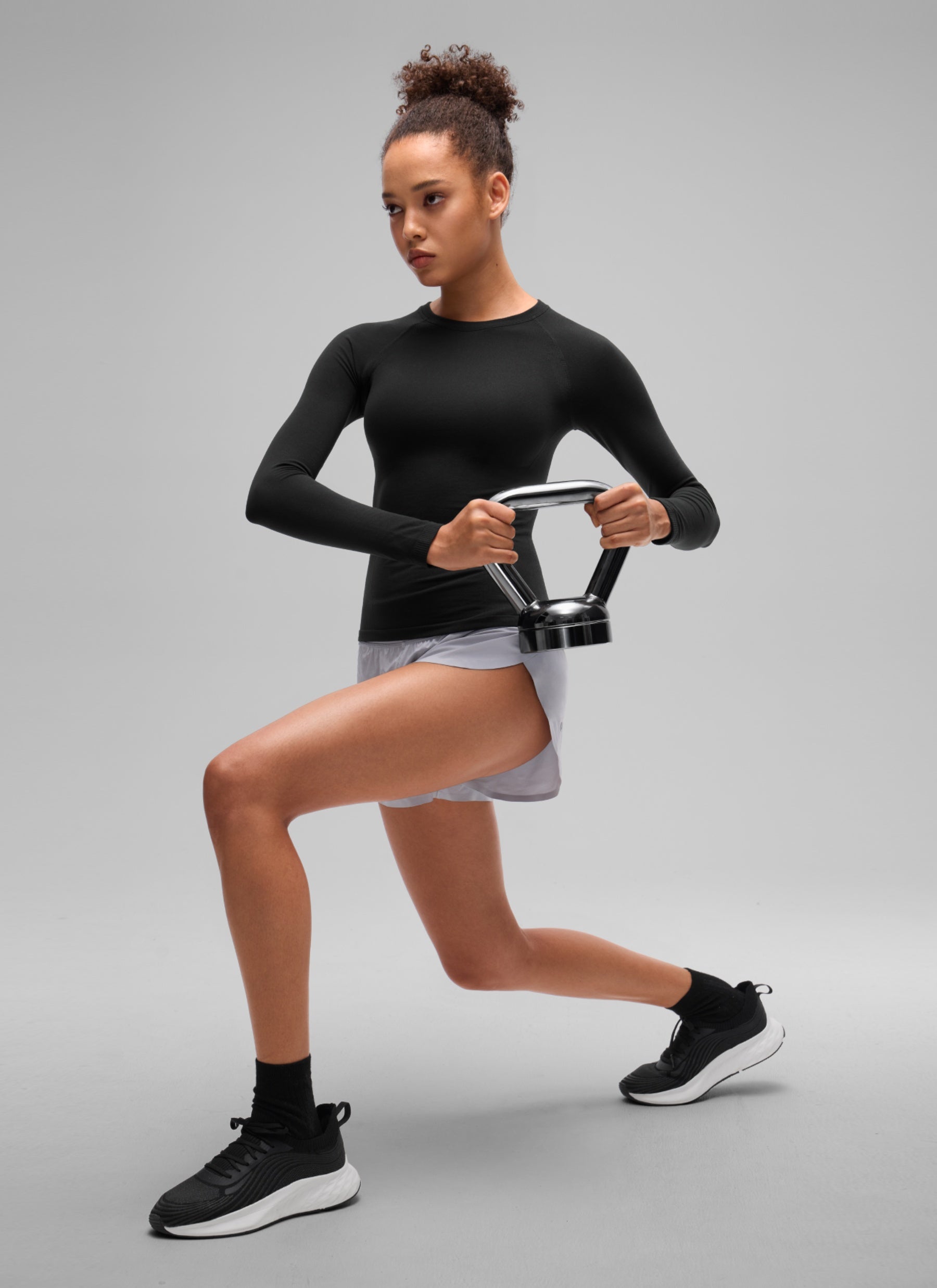 CRZ YOGA Women's Flex Seamless Fitted Workout Hip Length Long Sleeve Black @model_info:B
