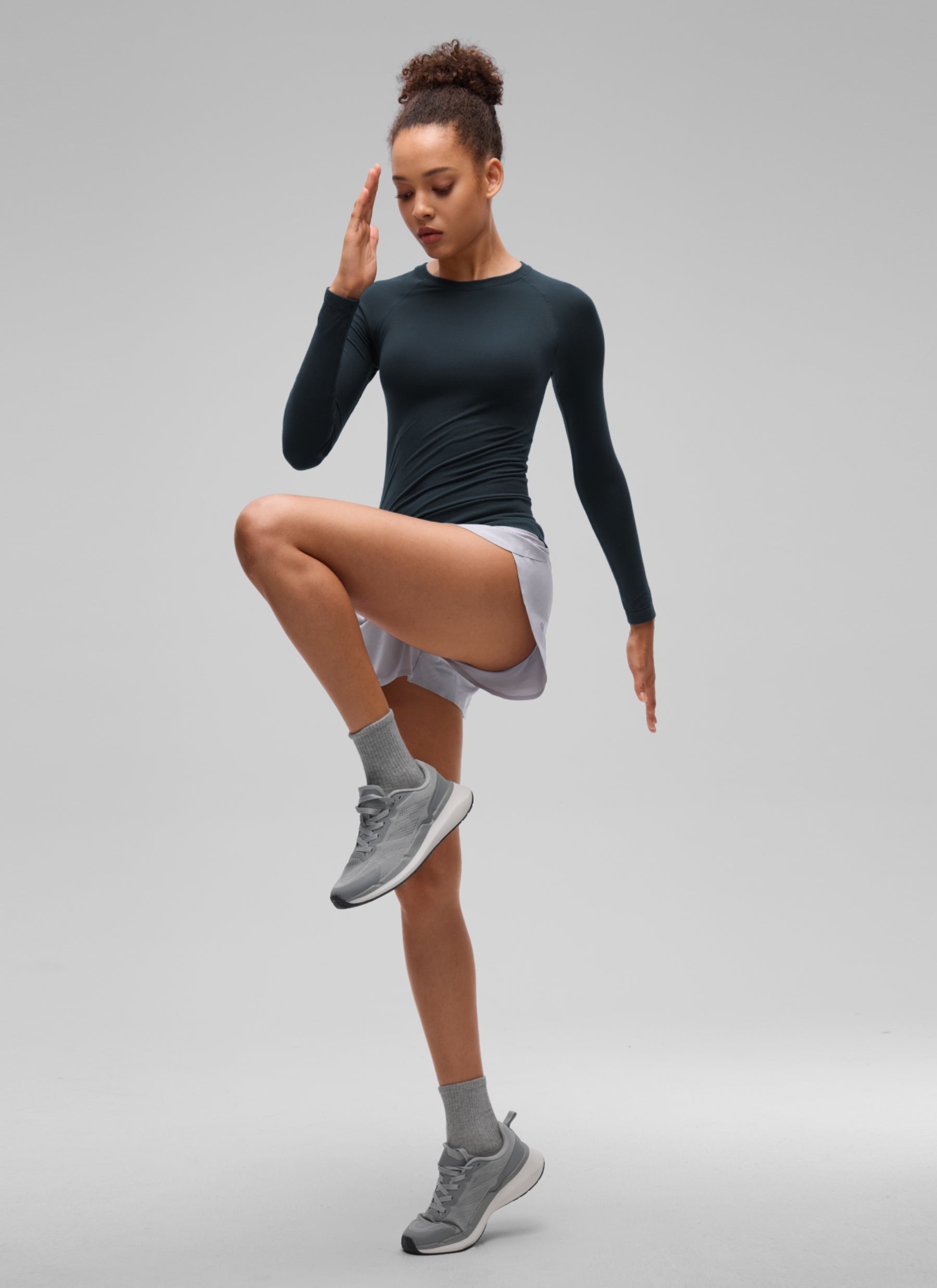 CRZ YOGA Women's Flex Seamless Fitted Workout Hip Length Long Sleeve True Navy @model_info:B