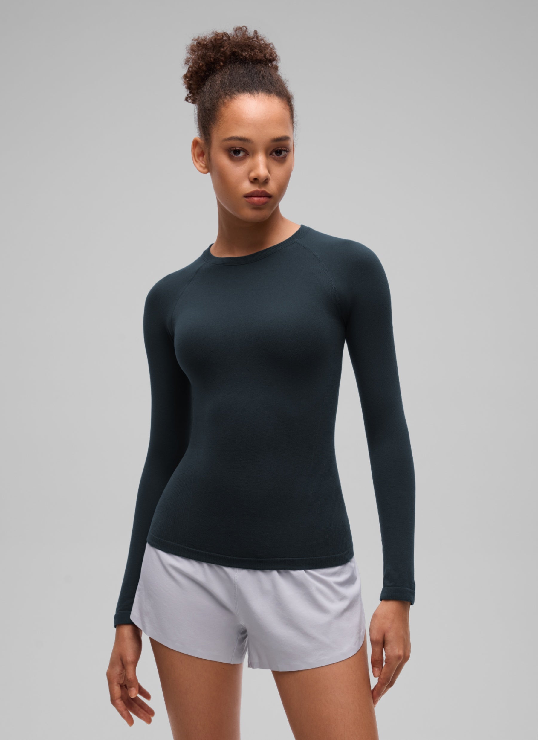 CRZ YOGA Women's Flex Seamless Fitted Workout Hip Length Long Sleeve True Navy @model_info:B