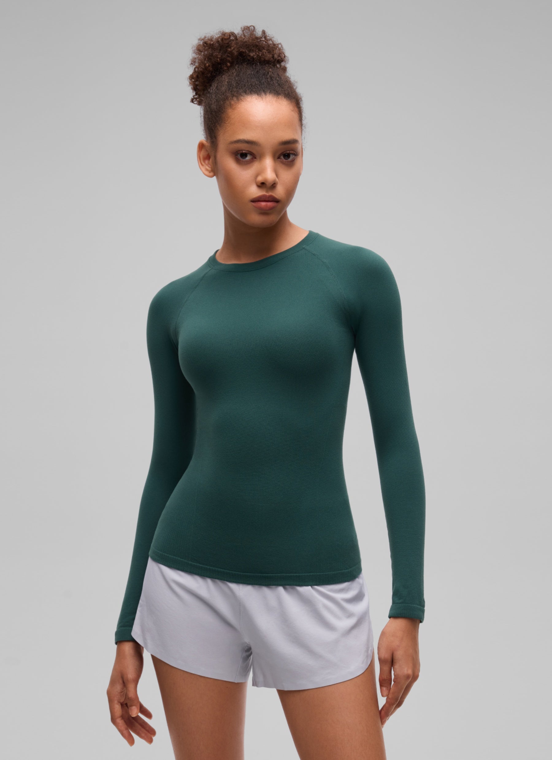 CRZ YOGA Women's Flex Seamless Fitted Workout Hip Length Long Sleeve Forest Green @model_info:B