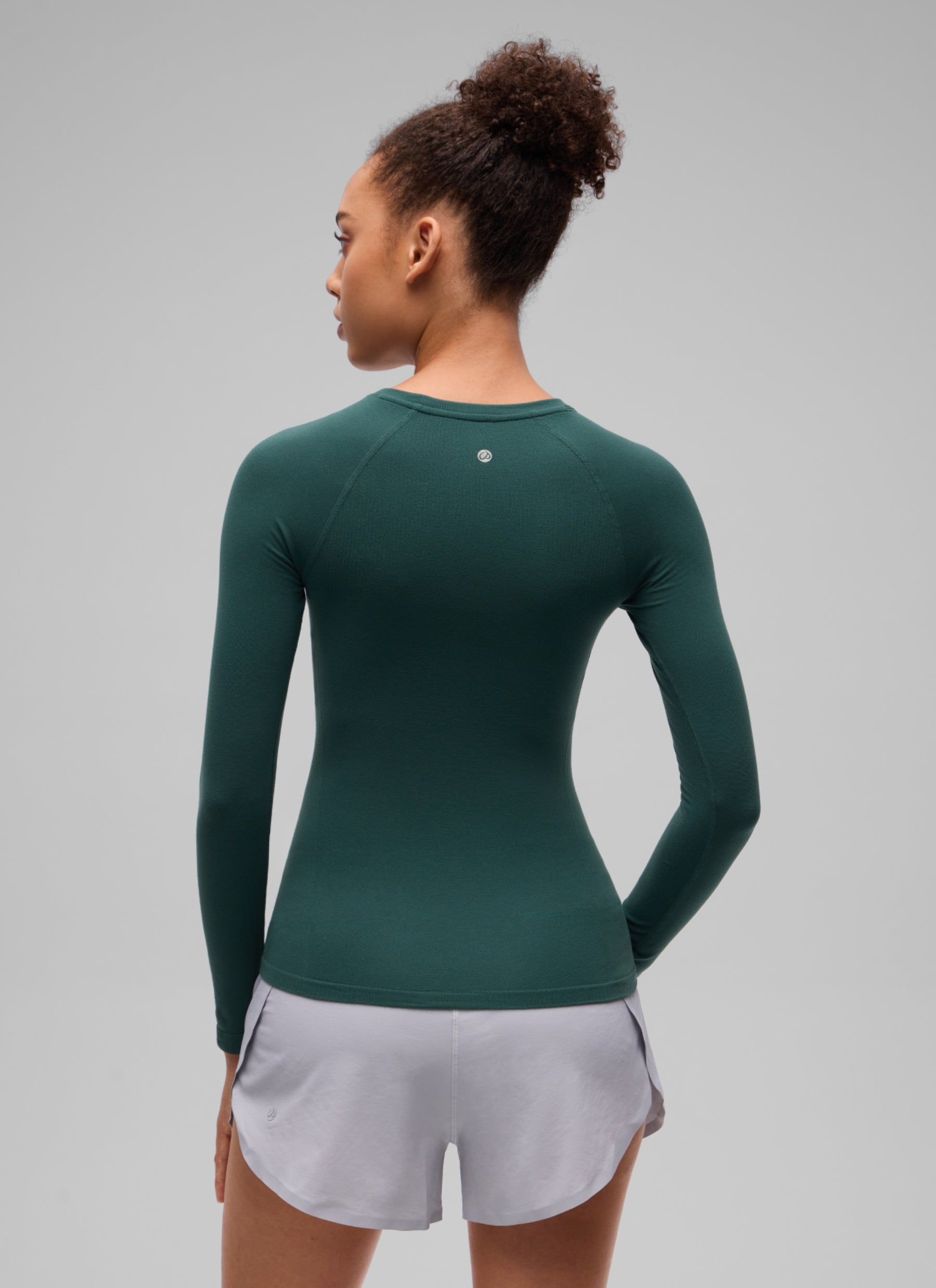 CRZ YOGA Women's Flex Seamless Fitted Workout Hip Length Long Sleeve Forest Green @model_info:B