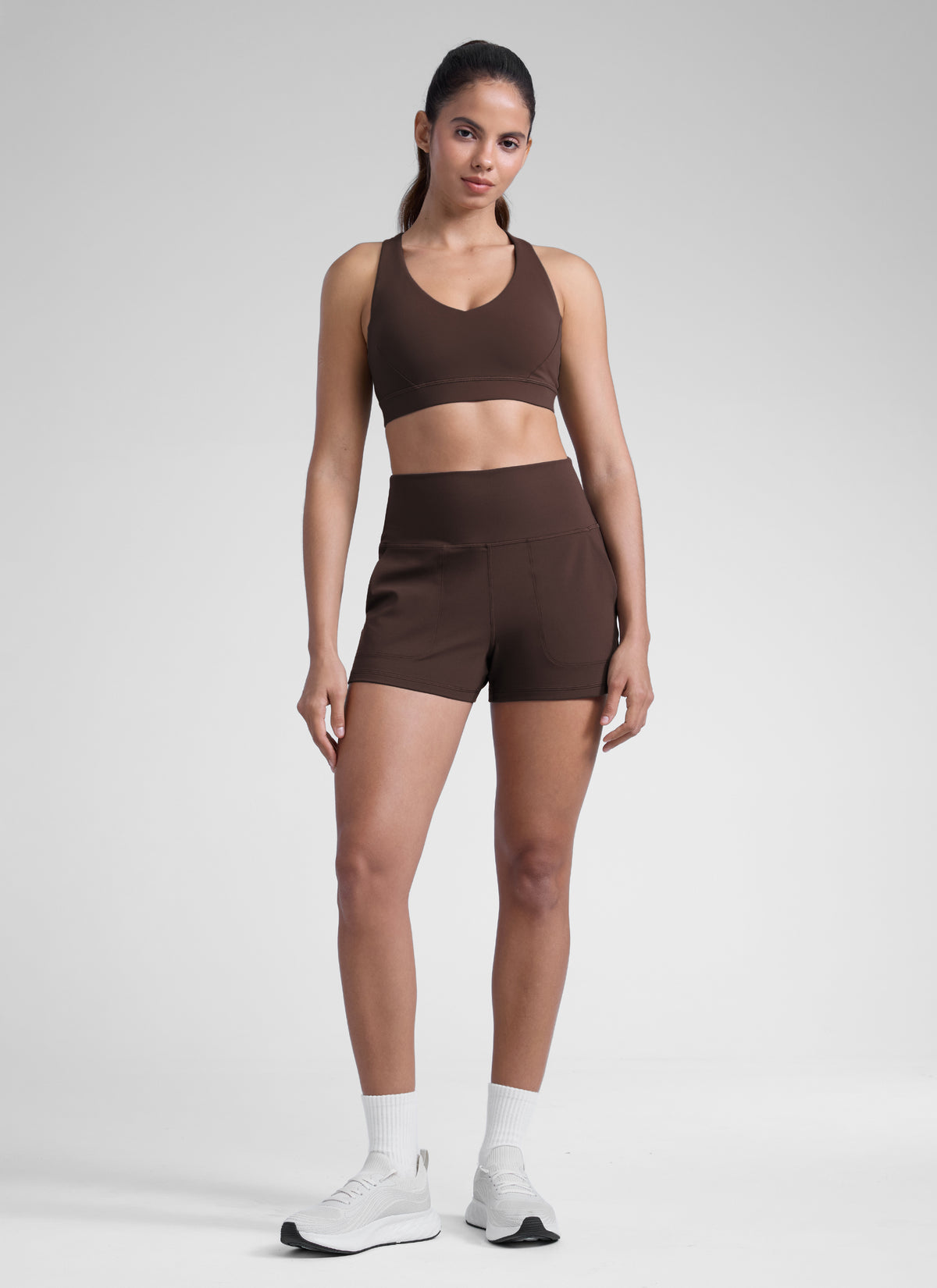 CRZ YOGA Women Butterlift High Waisted Shorts with Pockets Linerless Hot Fudge Brown @model_info:Dany