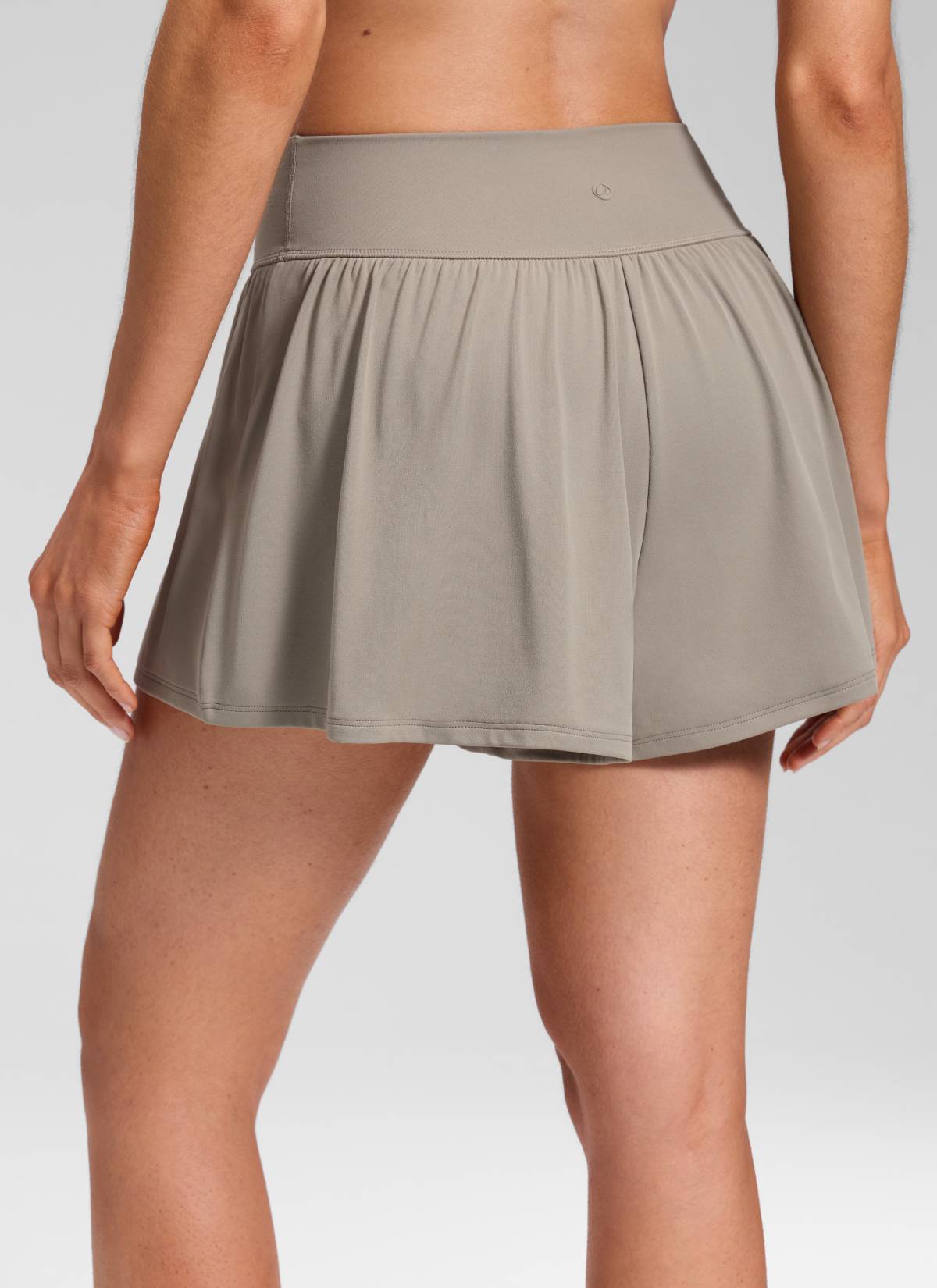 CRZ YOGA Women's Softretch Yoga High Rise Pocket Flowy 2 in 1 Shorts Warm Ash Grey @model_info:Marcela