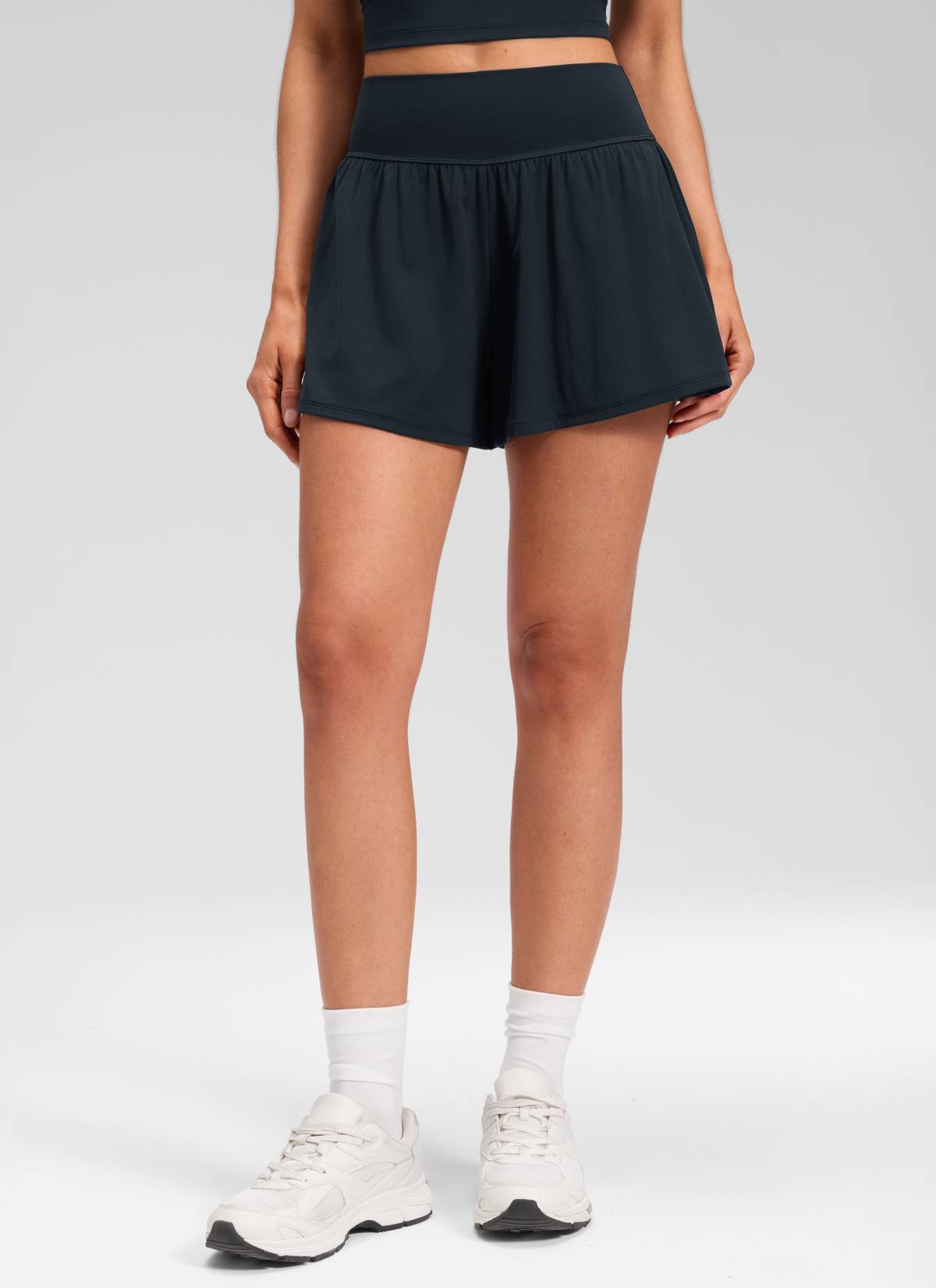 CRZ YOGA Women's Softretch Yoga High Rise Pocket Flowy 2 in 1 Shorts True Navy @model_info:Marcela
