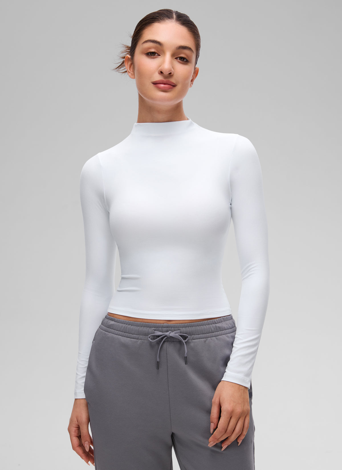 CRZ YOGA Women's Softembrace Mock Neck Waist Length Long Sleeves White @model_info:Inga