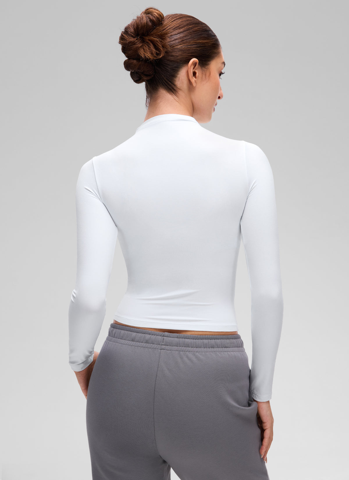 CRZ YOGA Women's Softembrace Mock Neck Waist Length Long Sleeves White @model_info:Inga