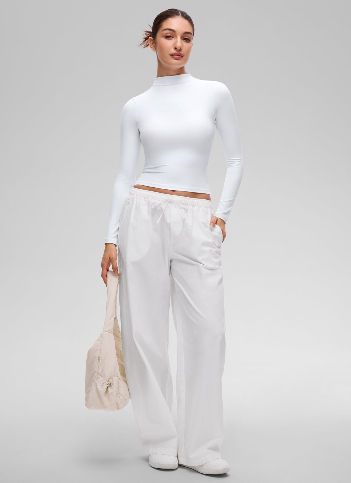 CRZ YOGA Women's Softembrace Mock Neck Waist Length Long Sleeves White @model_info:Inga
