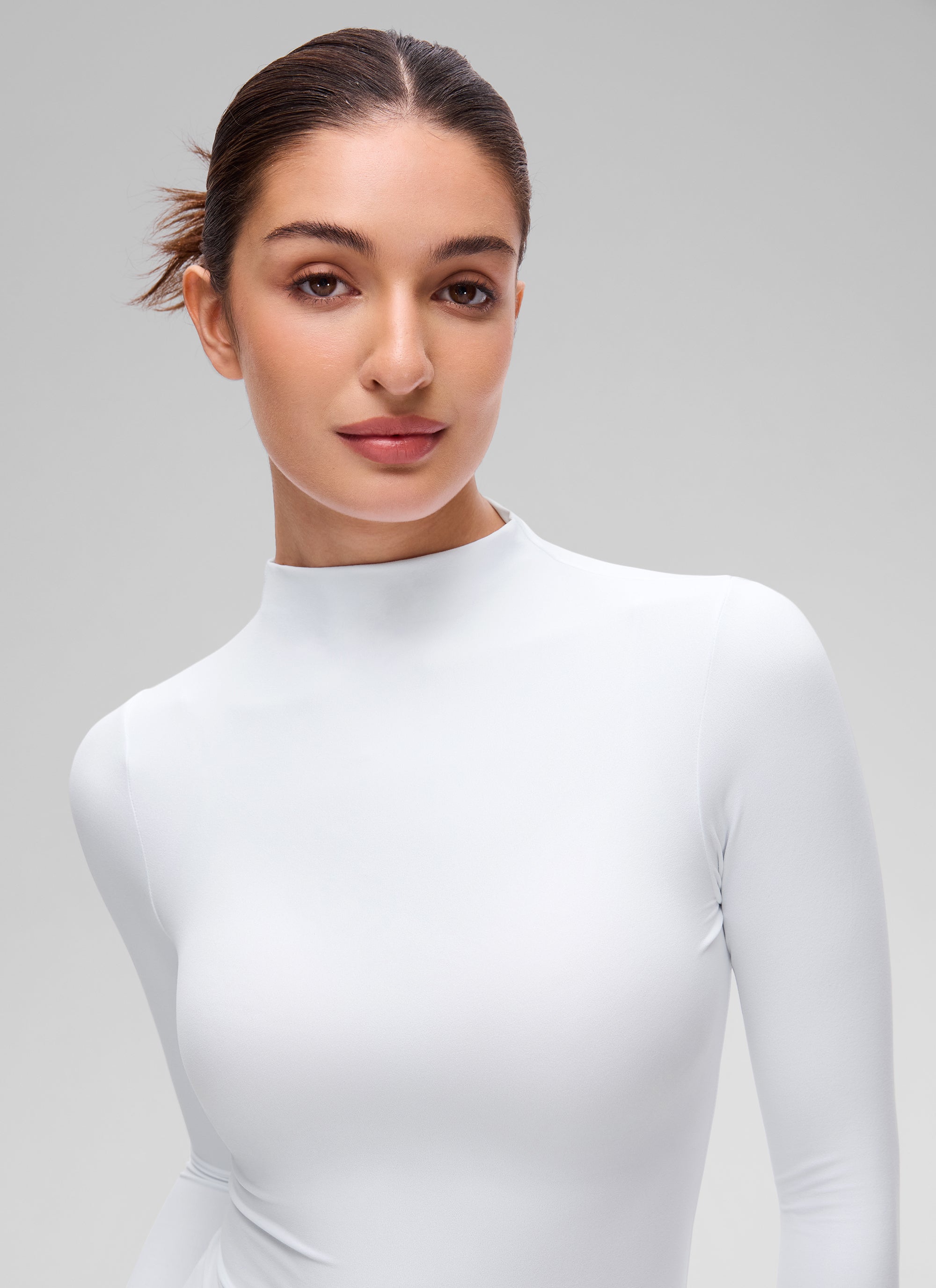 CRZ YOGA Women's Softembrace Mock Neck Waist Length Long Sleeves White @model_info:Inga