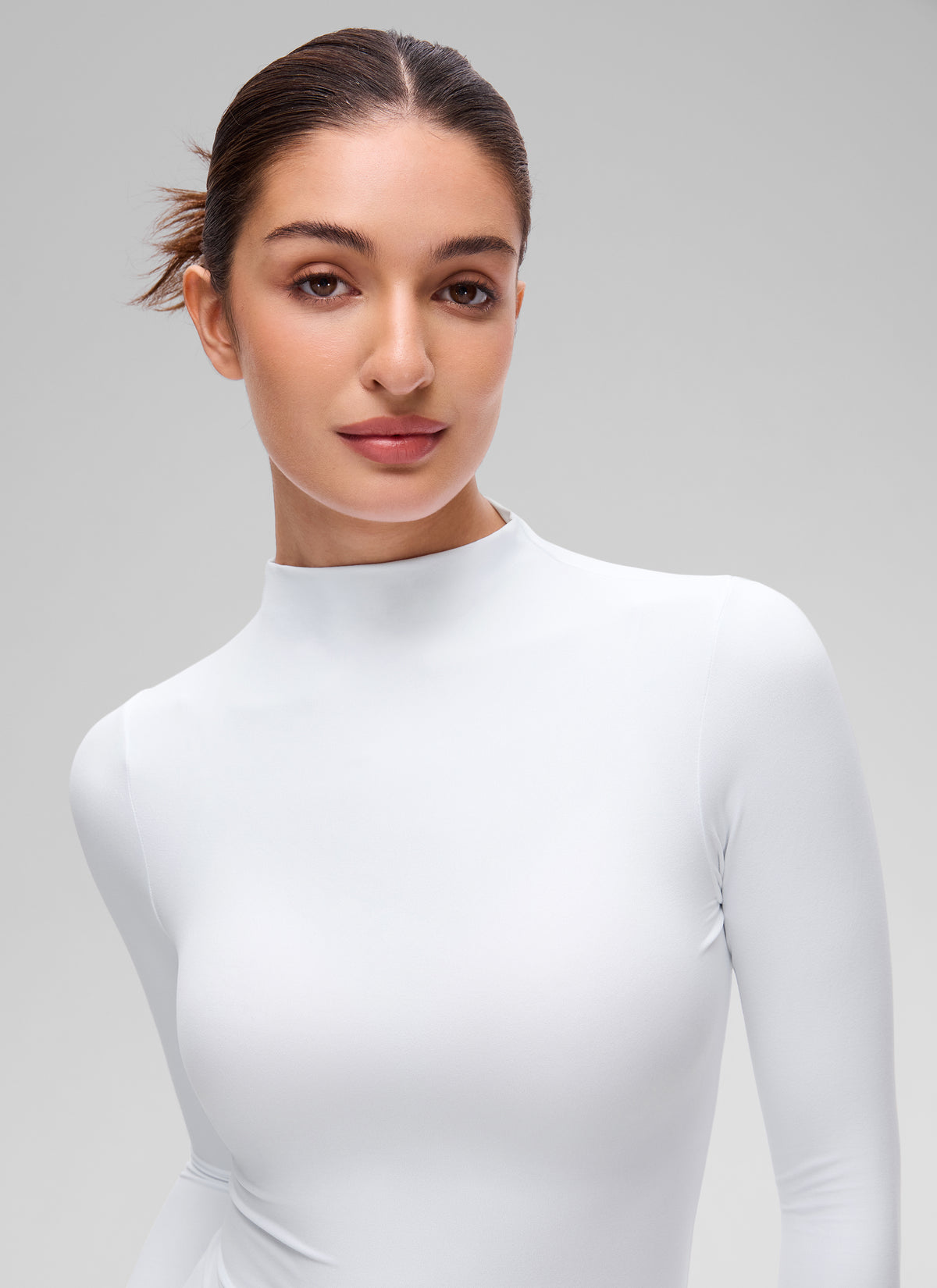 CRZ YOGA Women's Softembrace Mock Neck Waist Length Long Sleeves White @model_info:Inga