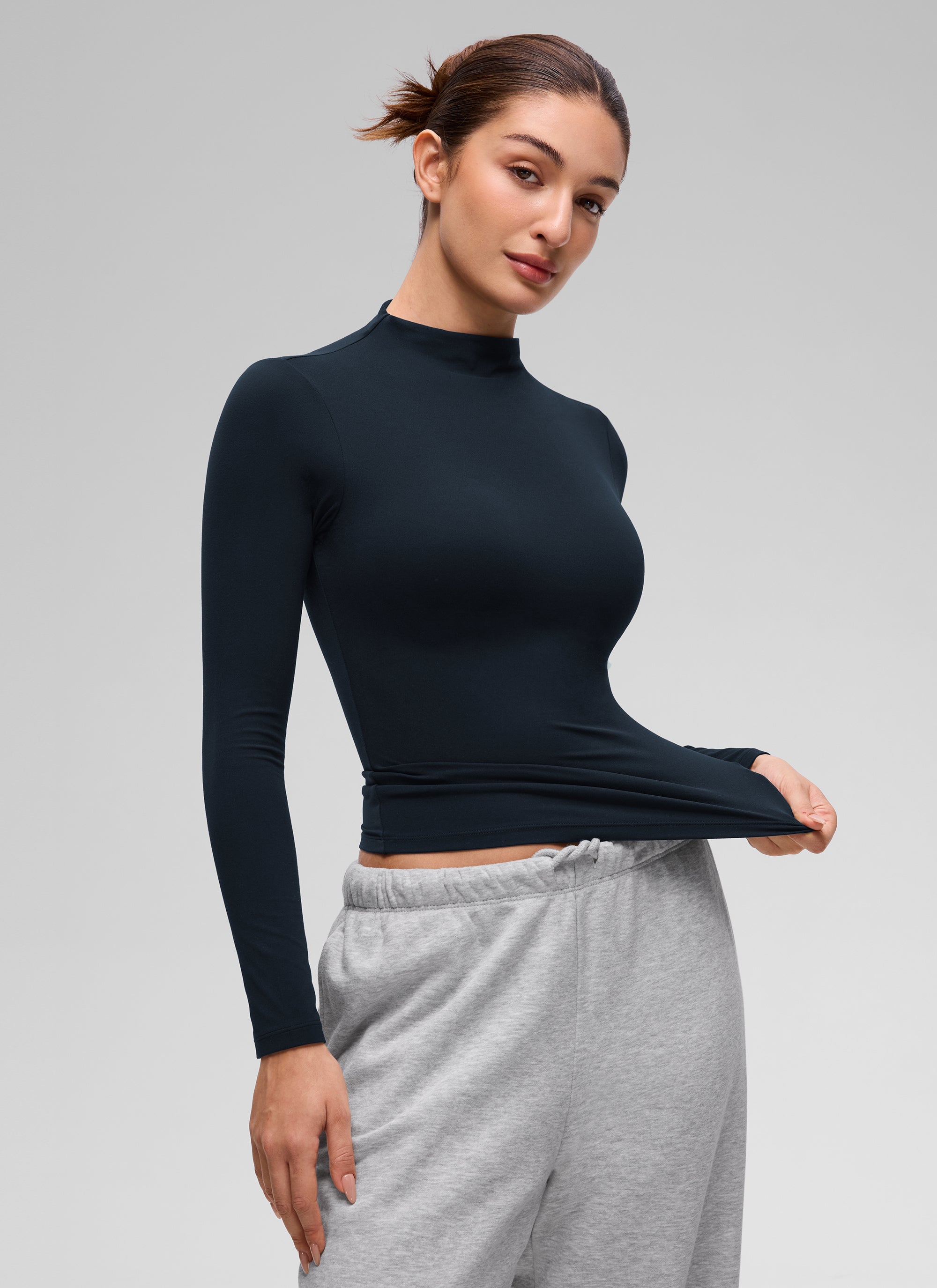CRZ YOGA Women's Softembrace Mock Neck Waist Length Long Sleeves True Navy @model_info:Inga