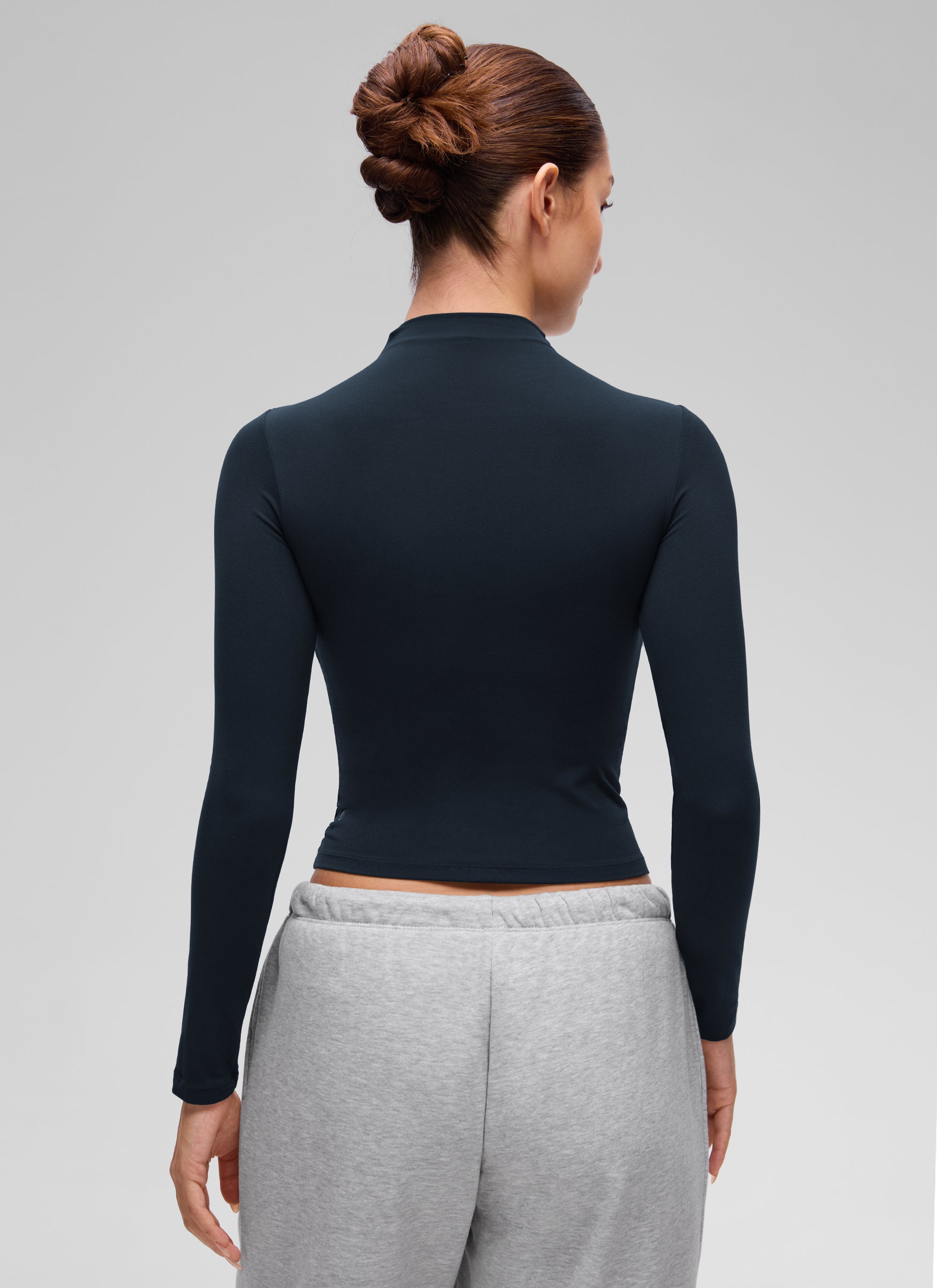 CRZ YOGA Women's Softembrace Mock Neck Waist Length Long Sleeves True Navy @model_info:Inga