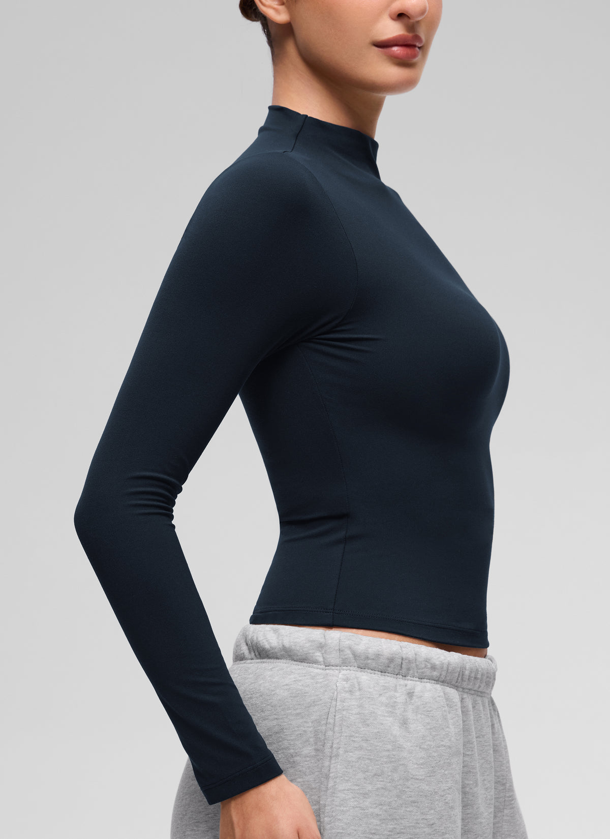 CRZ YOGA Women's Softembrace Mock Neck Waist Length Long Sleeves True Navy @model_info:Inga
