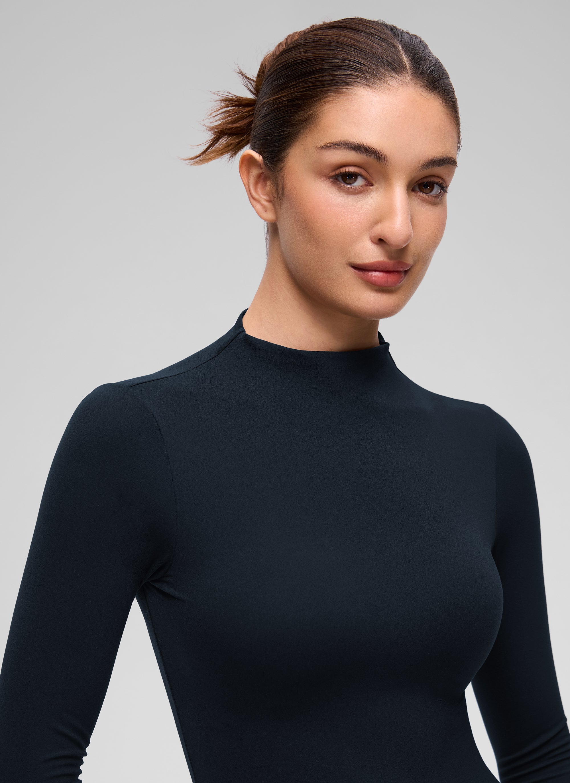 CRZ YOGA Women's Softembrace Mock Neck Waist Length Long Sleeves True Navy @model_info:Inga