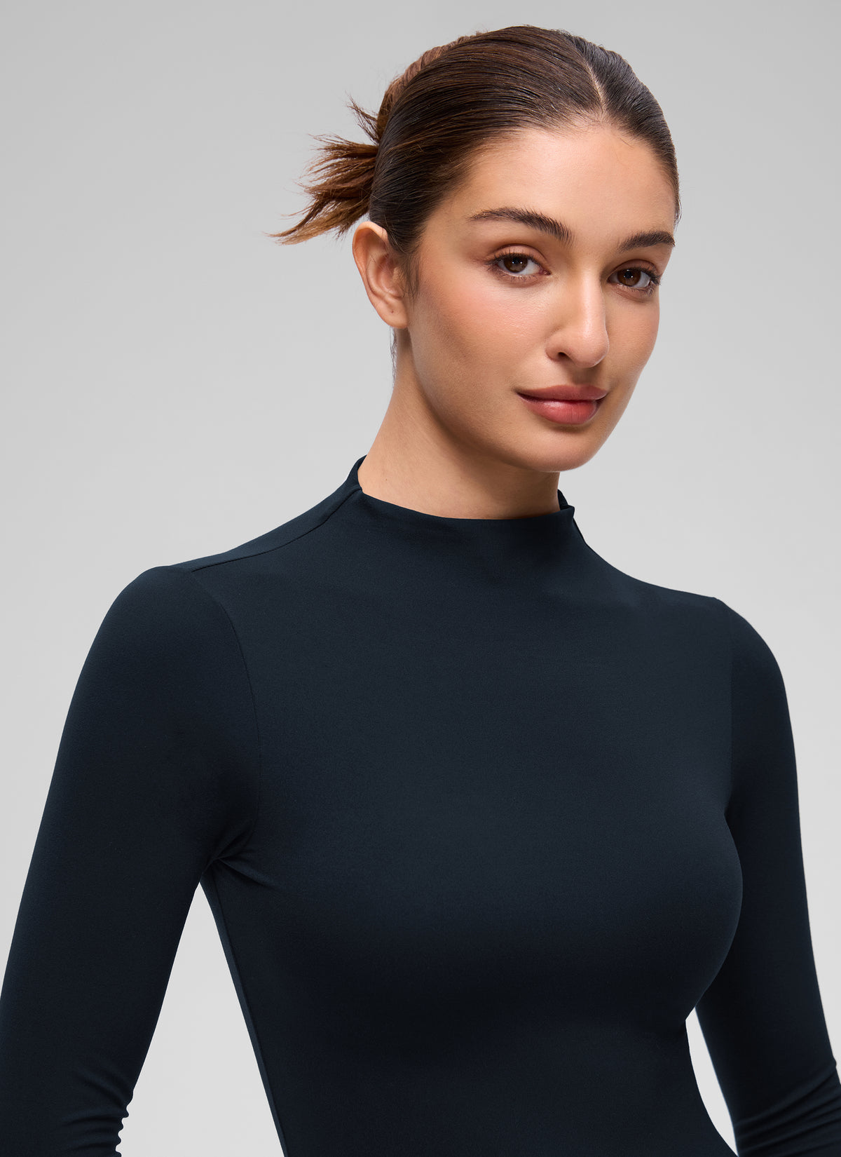 CRZ YOGA Women's Softembrace Mock Neck Waist Length Long Sleeves True Navy @model_info:Inga